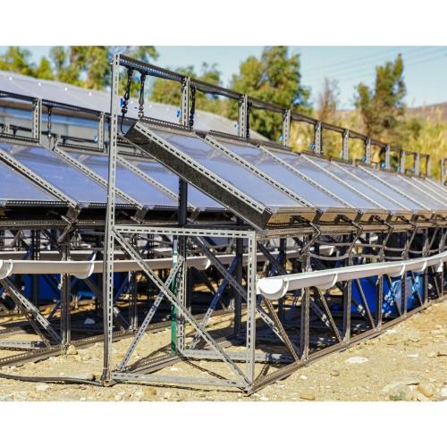 Real scale demosite in Tinos islands: 80 solar desalination units producing freshwater to water a tropical fruit and aloe greenhouse